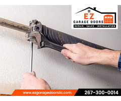 Hassle-free Garage Door Spring Replacement - EZ Garage Doors