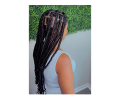 African hair braiding by Aida